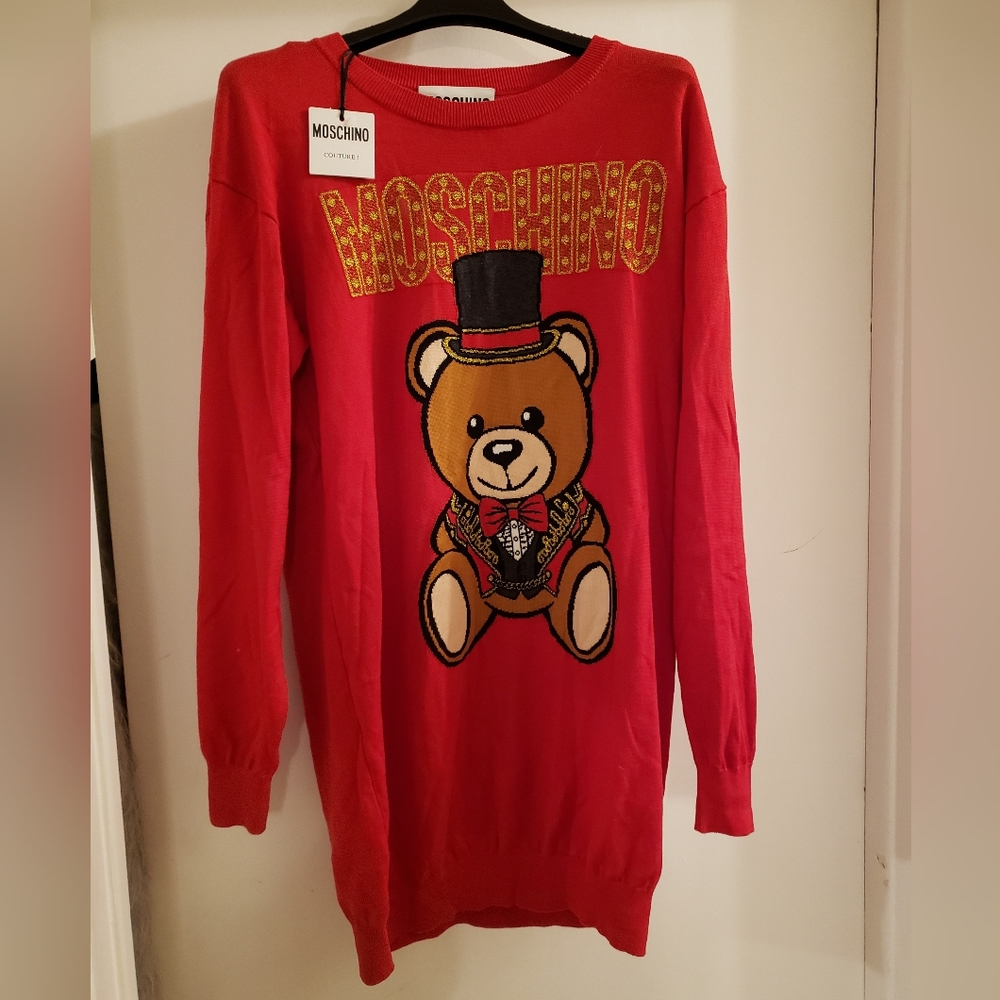 Moschino Couture tags on oversized tunic sweater dress